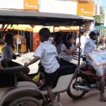 Students take tuk tuks from the village to the dental clinic